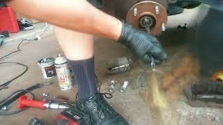 How To Remove a Stuck CV Axle From a Wheel Hub [upl. by Eenattirb]