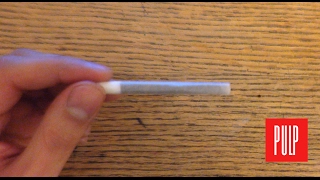 How to roll a cigarette [upl. by Ardiedak452]